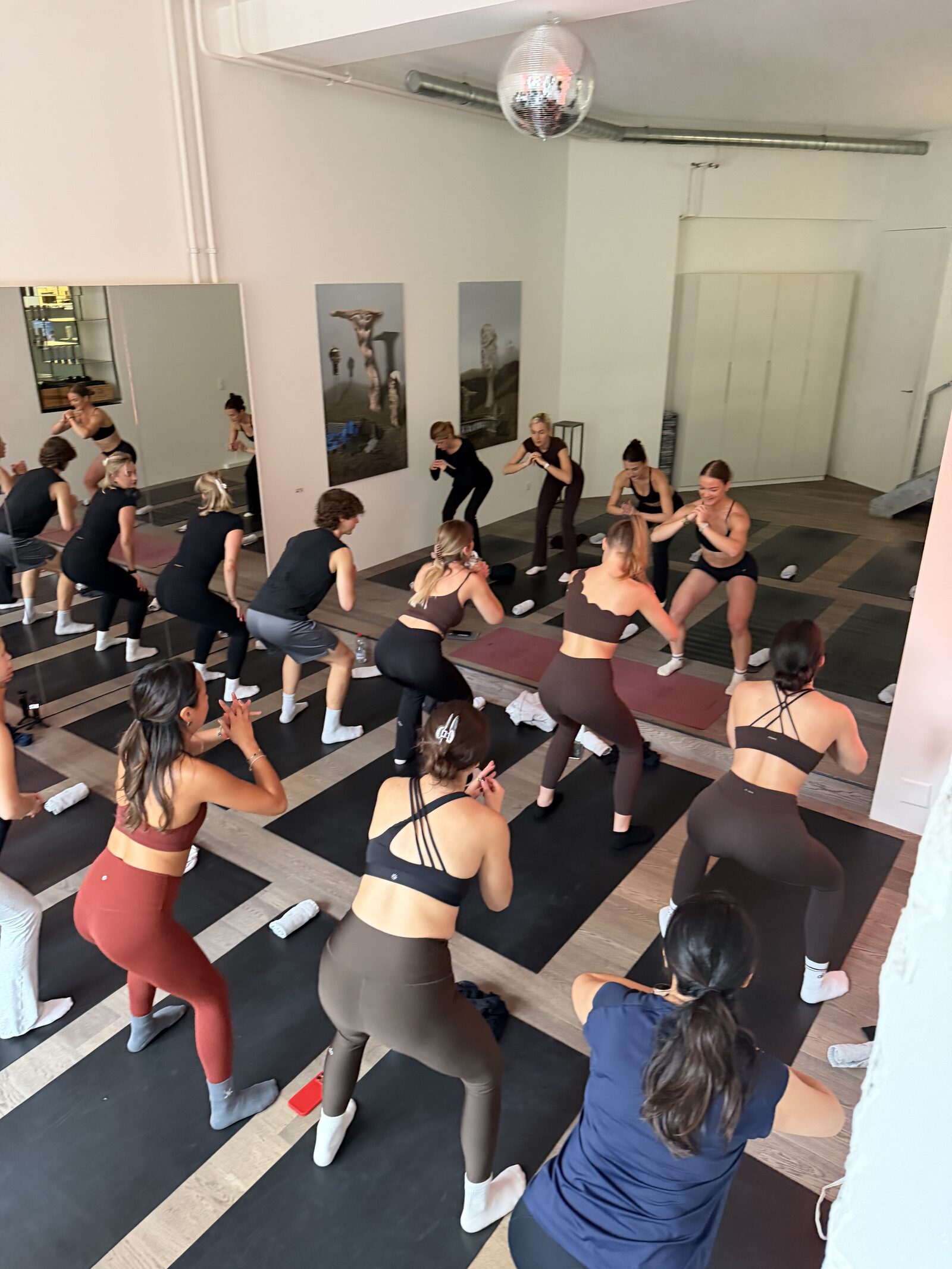 Founding Members moving together in a group workout at the Saya Suka launch event in Zurich